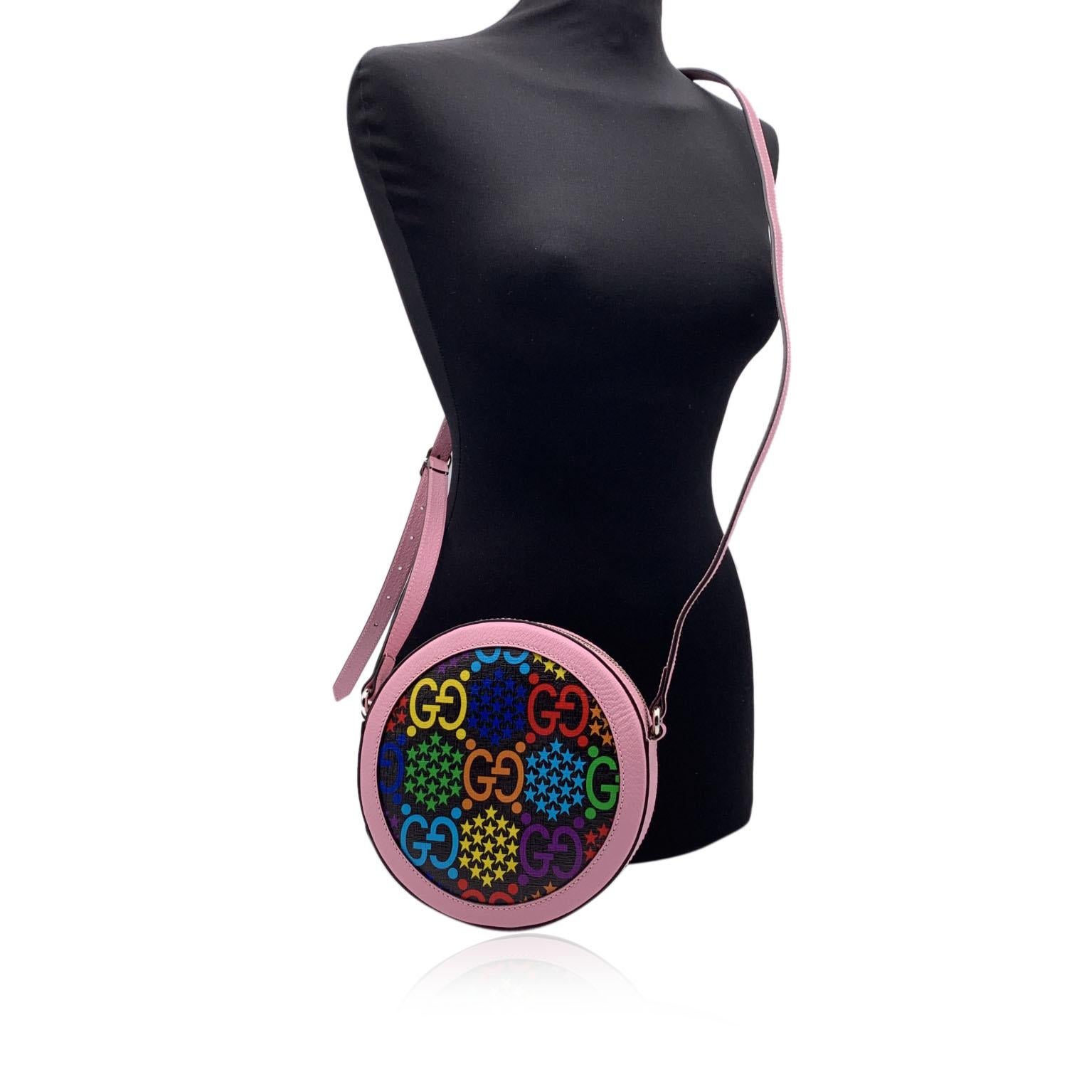 GUCCI Multicolor GG Supreme Monogram 'Psychedelic' Round Shoulder Bag with Pink trim and shoulder strap. It features an adjustable leather shoulder strap, upper zipper closure and black fabric lining. 'Gucci - Made in Italy' tag inside (with serial