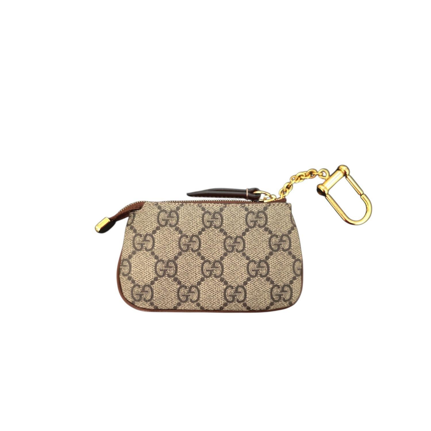 Llavero Gucci GG Supreme Monograma 447964 Marrón en venta