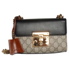 Gucci, GG supreme Monogram padlock bag