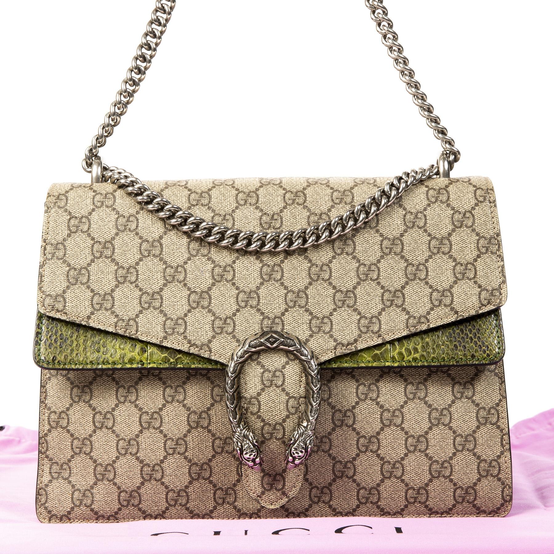 Very good preloved condition

Gucci GG Supreme Monogram Python Dionysus

This very special Gucci Dionysus comes in the iconic Supreme Monogram pattern and is finished with dark green python leather The bag features the famous horseshoe closure with