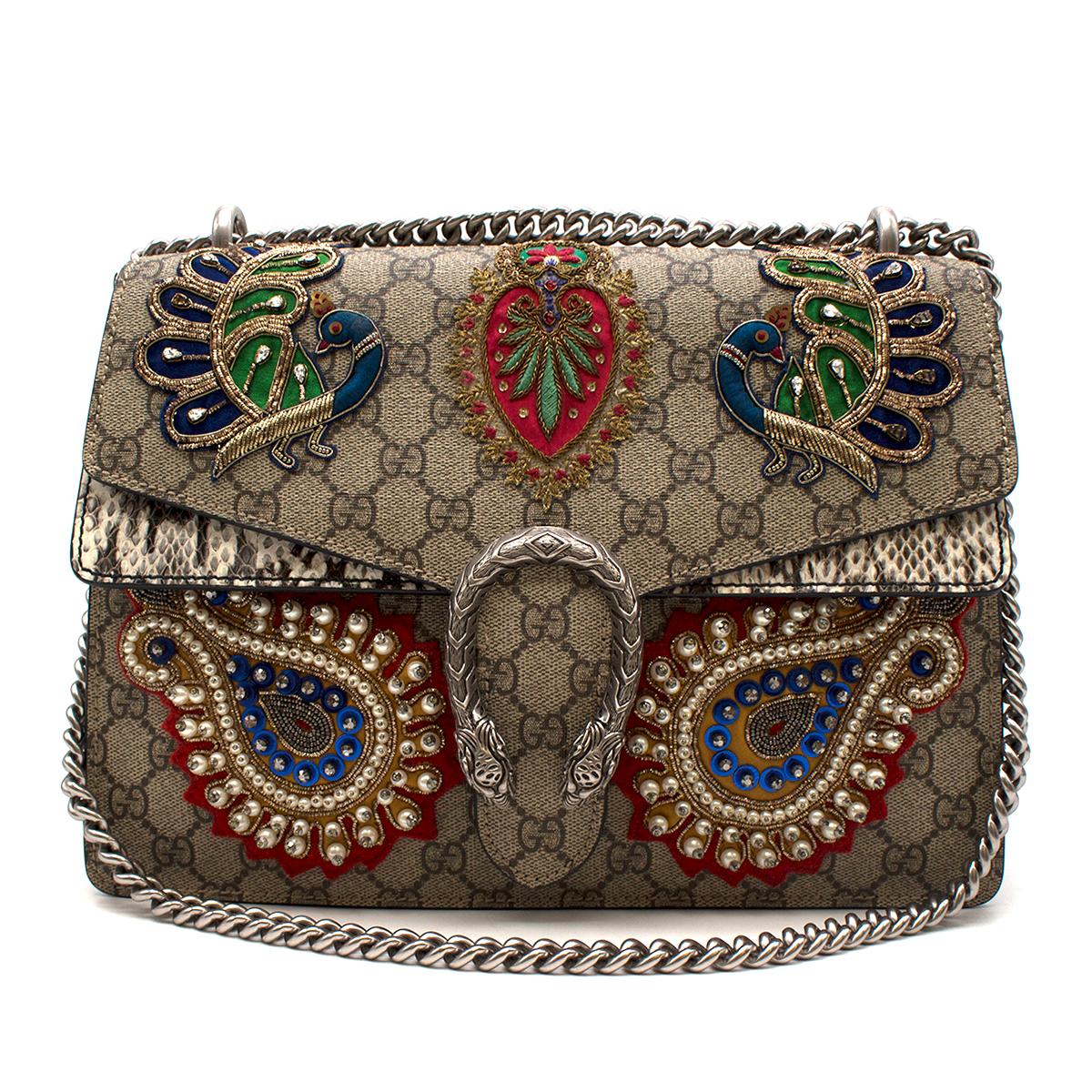 GUCCI GG Supreme Monogram Python Embroidered Dionysus Bag

-Dionysus flap bag 
-Monogram canvas and Python Body
-Peacock patch applique 
-Push clasp closure
-Two main interior pockets with one zipped interior pocket and one small interior
