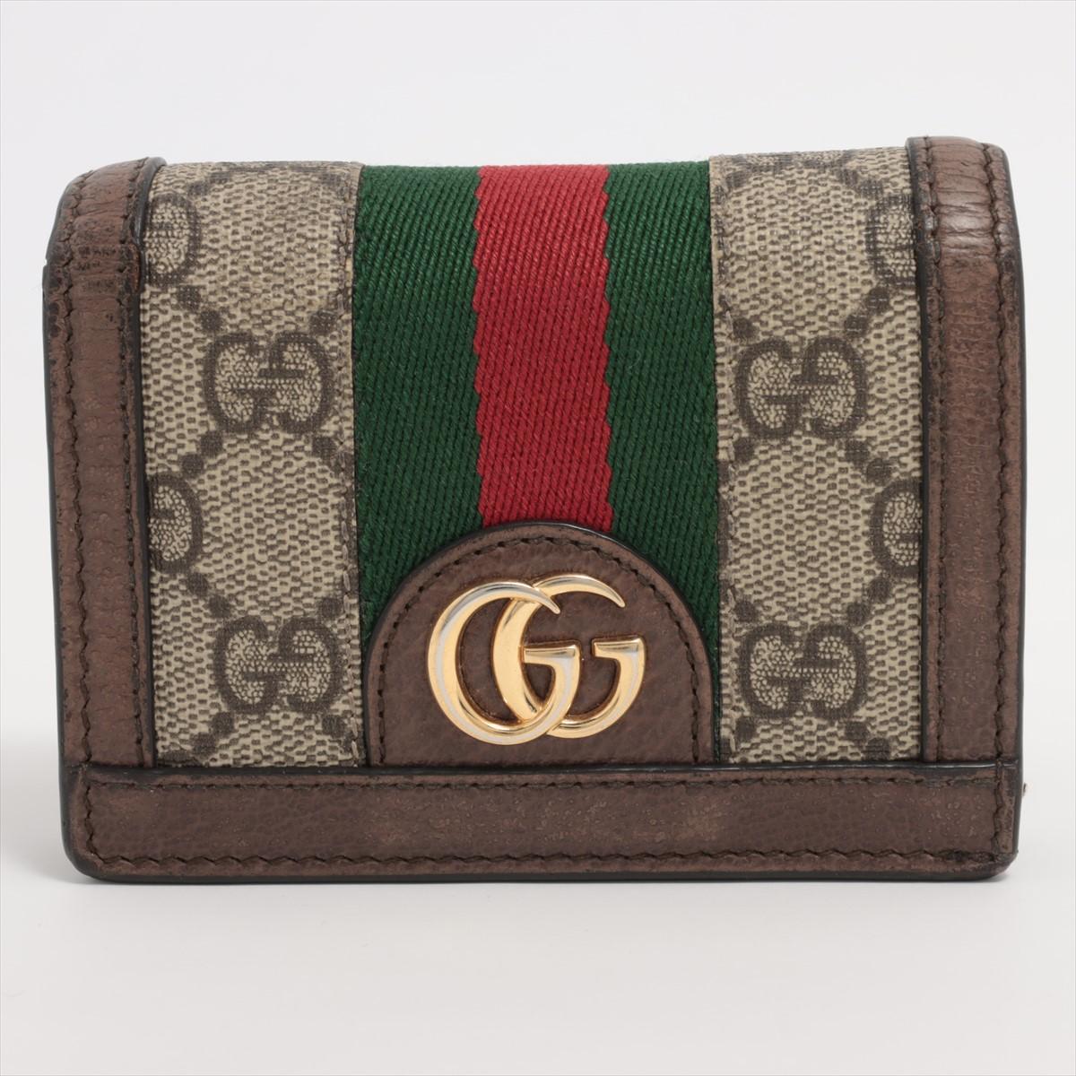 The Gucci GG Supreme Ophidia Card Case Wallet embodies a perfect fusion of timeless elegance and contemporary style. Crafted from the iconic GG Supreme canvas, the monogram pattern exudes sophistication while showcasing the brand's rich heritage.