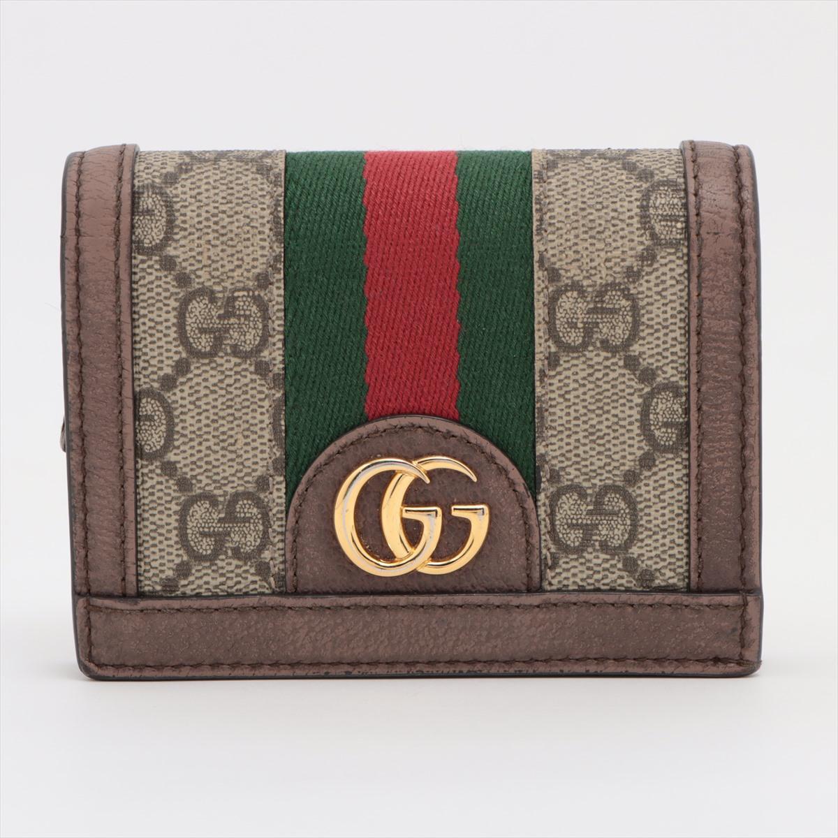 The Gucci GG Supreme Ophidia Card Case Wallet embodies a perfect fusion of timeless elegance and contemporary style. Crafted from the iconic GG Supreme canvas, the monogram pattern exudes sophistication while showcasing the brand's rich heritage.