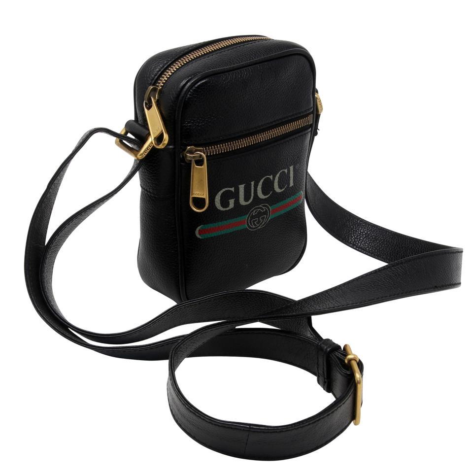 Gucci GG Supreme Portfolio Print Shoulder 523591 Black Leather Messenger Bag

Travel with an attitude in this Gucci Unisex GG Supreme Leather Trim messenger Bag. It features Retro Logo stripe leather handles with red/green webb trim. With its