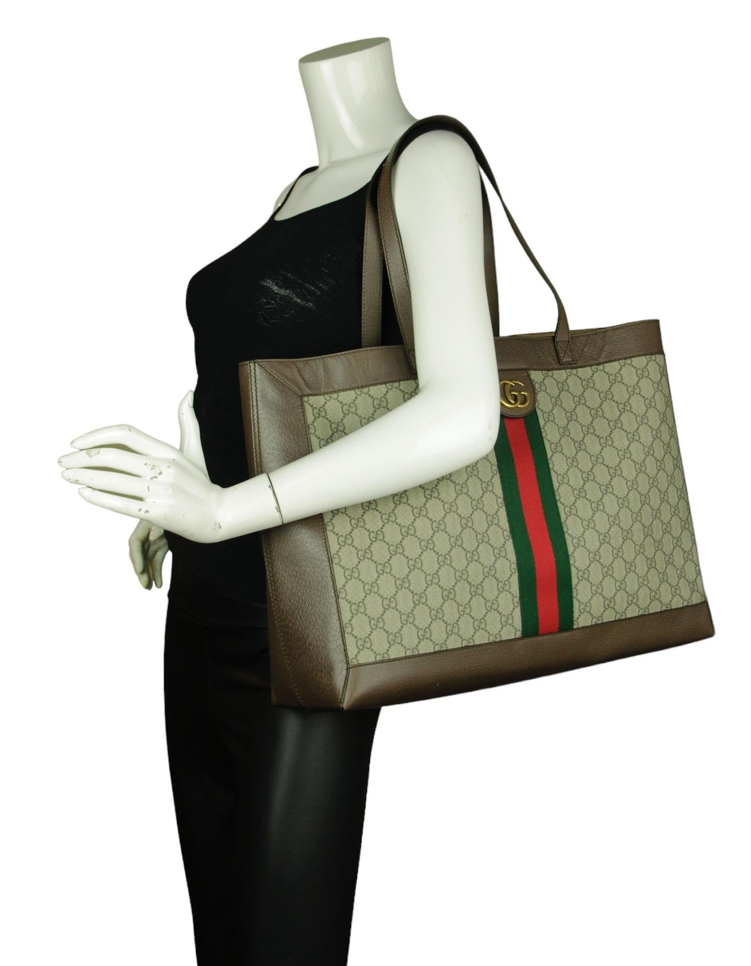 Gucci Monogram GG Supreme Web Canvas Soft Ophidia Tote Bag

Made In: Italy
Color: Brown, beige, red and green
Hardware: Goldtone
Materials: Coated canvas and leather
Lining: Fine textile
Closure/Opening: Open
Exterior Pockets: None
Interior Pockets:
