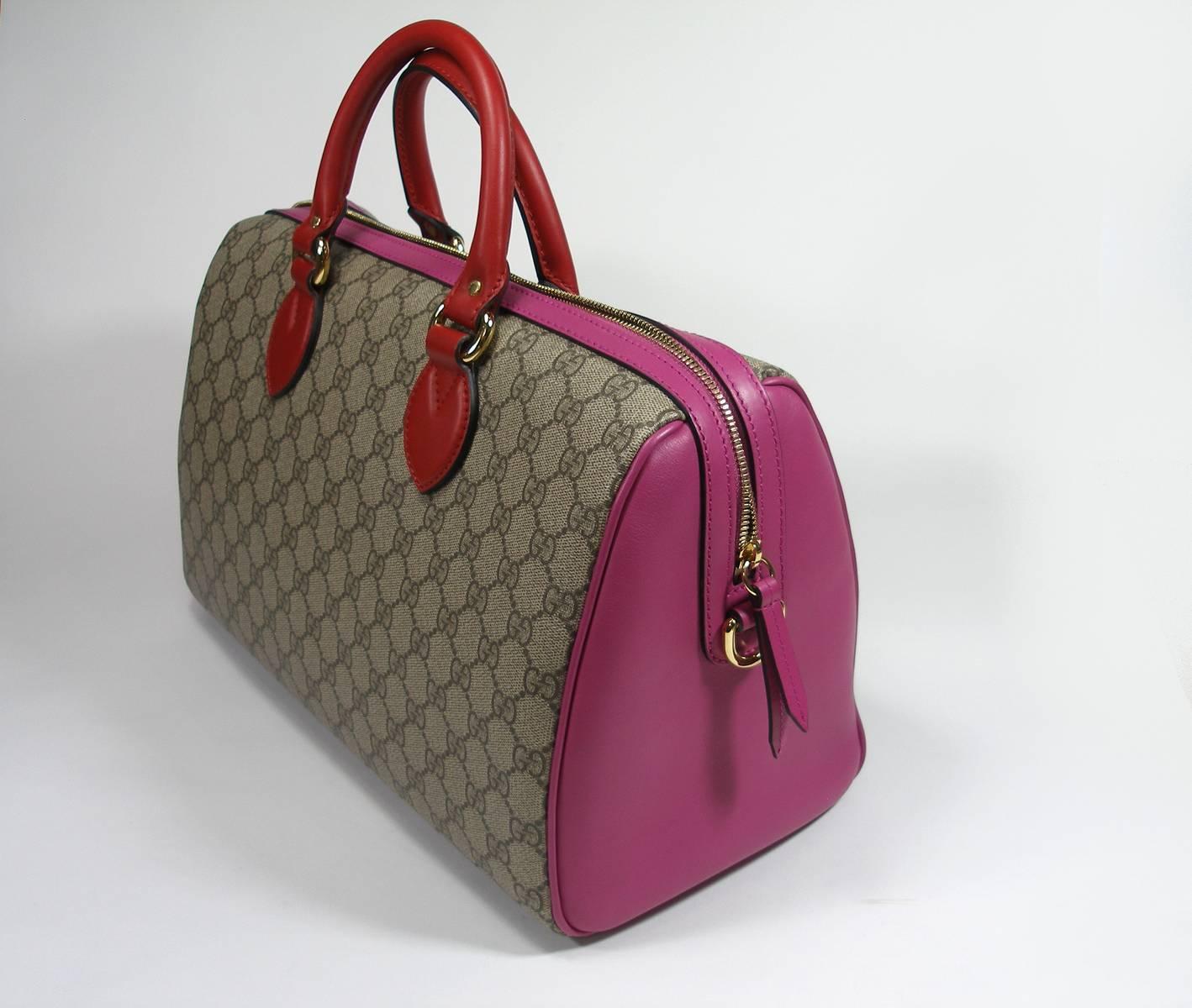 Magnifique Gucci Bag
Rare color / multicolour
BEIGE / PINK / RED
Canvas print with pink leather trim and sides
Red top handles
Adjustable removable long Strap
Hardware: Goldtone
Origine : italie
Collection Edition Limited 2016 
Code date inside (
