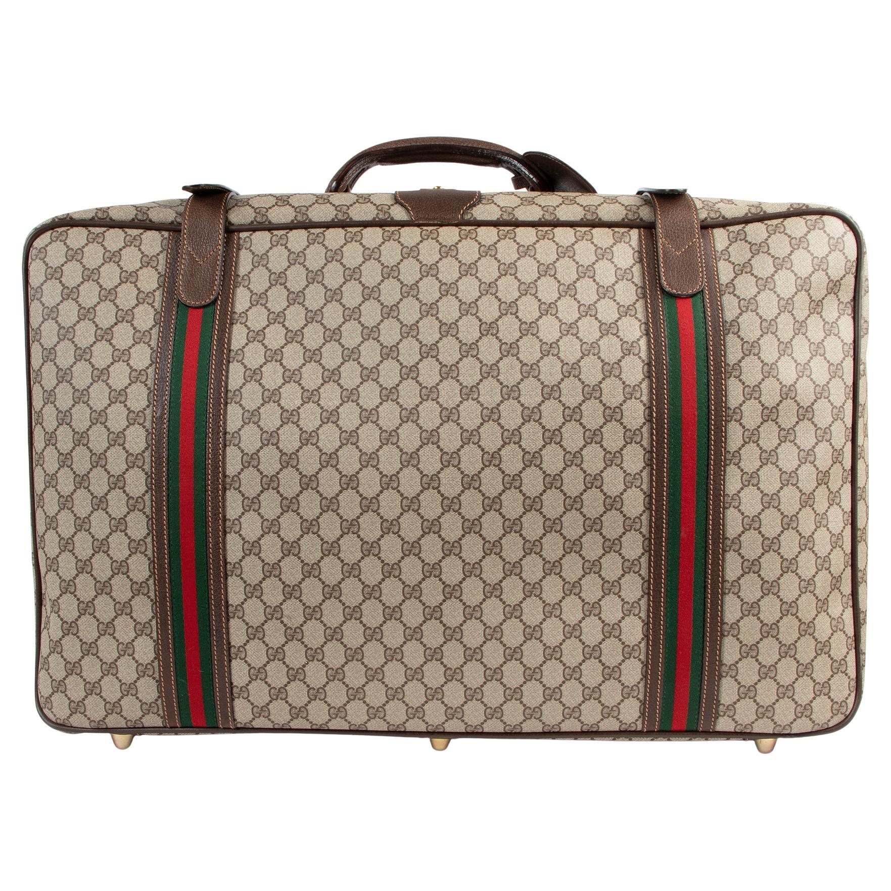 Gucci (italian) Leather And Canvas Luggage And Garment Bag Auction
