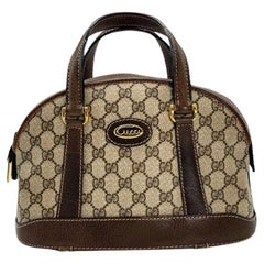 Gucci GG Vintage Brown Monogram Dome Top Handle Bag