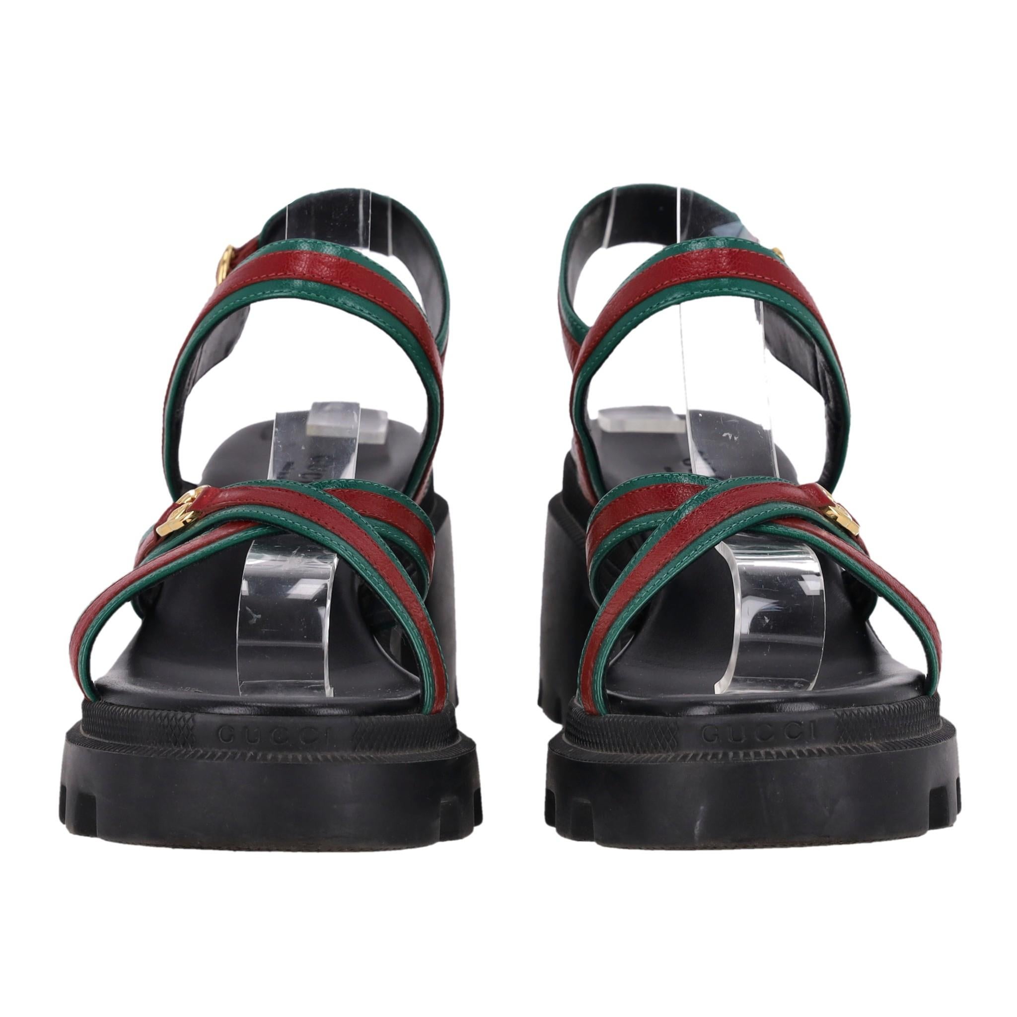 Gucci GG Web Stripe Nappa Leather Lug Sole Sandals

Black sandals crafted from Nappa leather with the brand's signature red and green Web stripe design detailed with a gold 'GG' logo.

Featuring chunky lug soles and ankle buckle closure.

Rrp