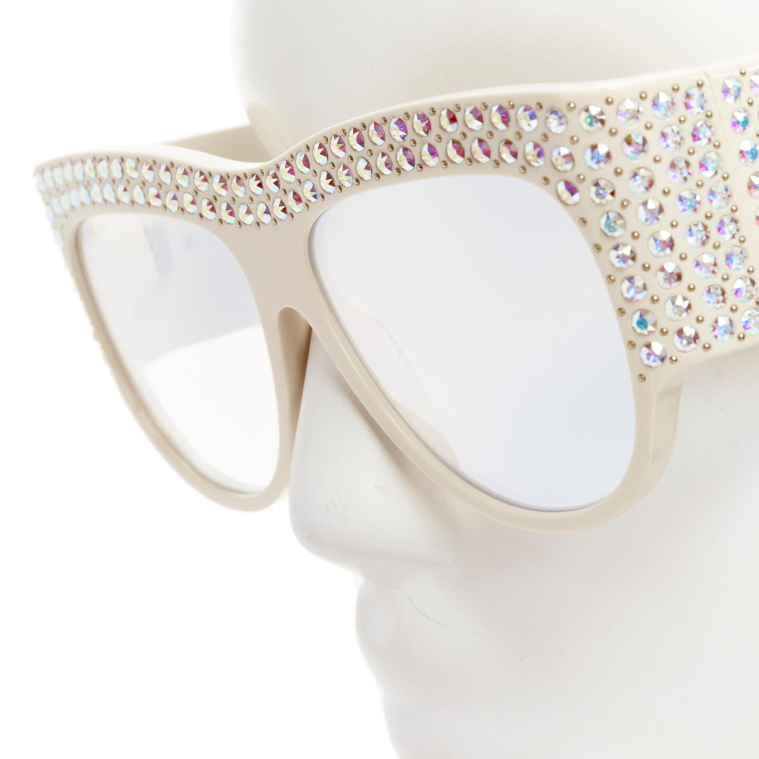 Gray GUCCI GG0144S white crystal rhinestone GG logo reflective oversized sunglasses