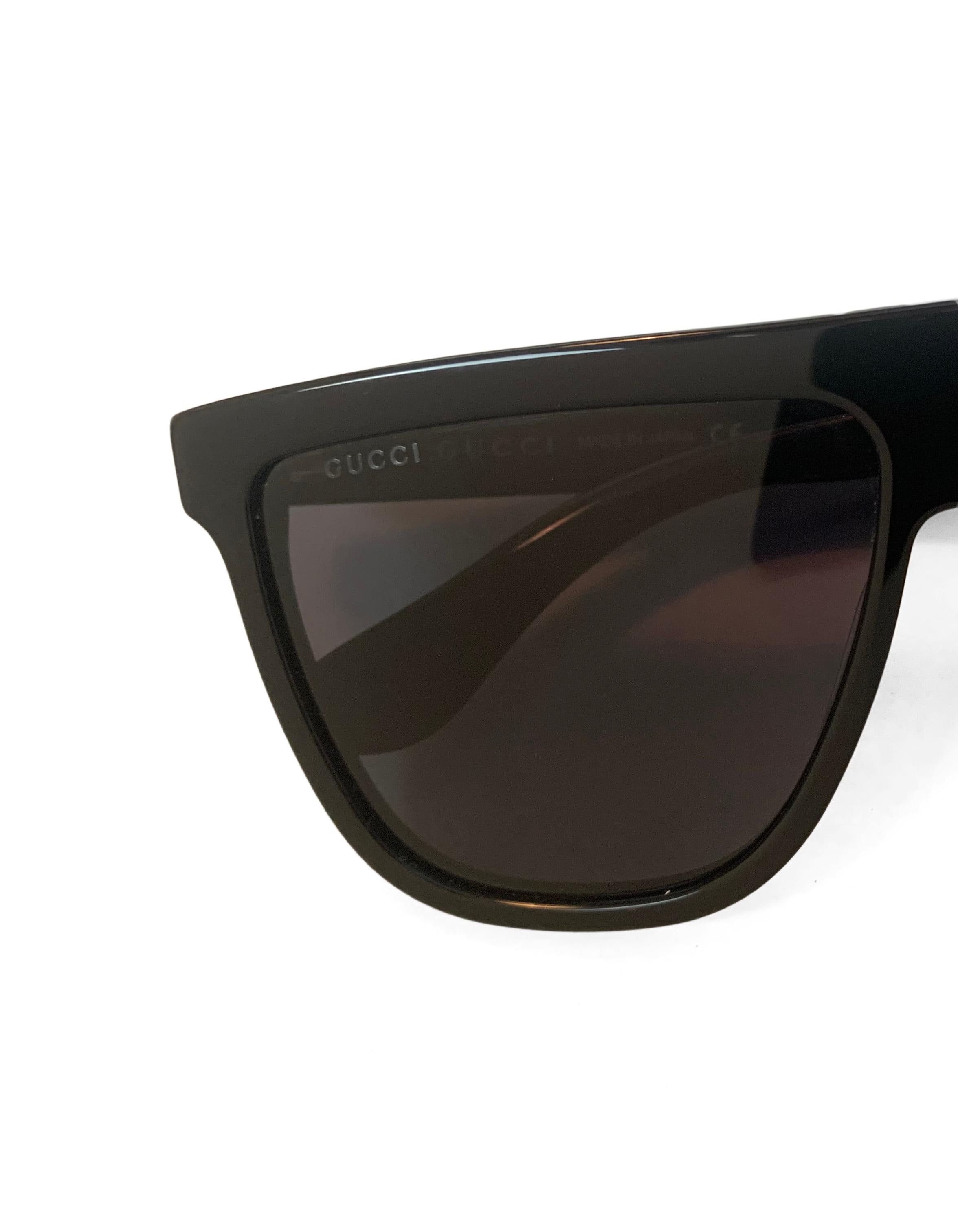 Gucci GG0582S Black Oversized Flat-Top Sunglasses. Features 