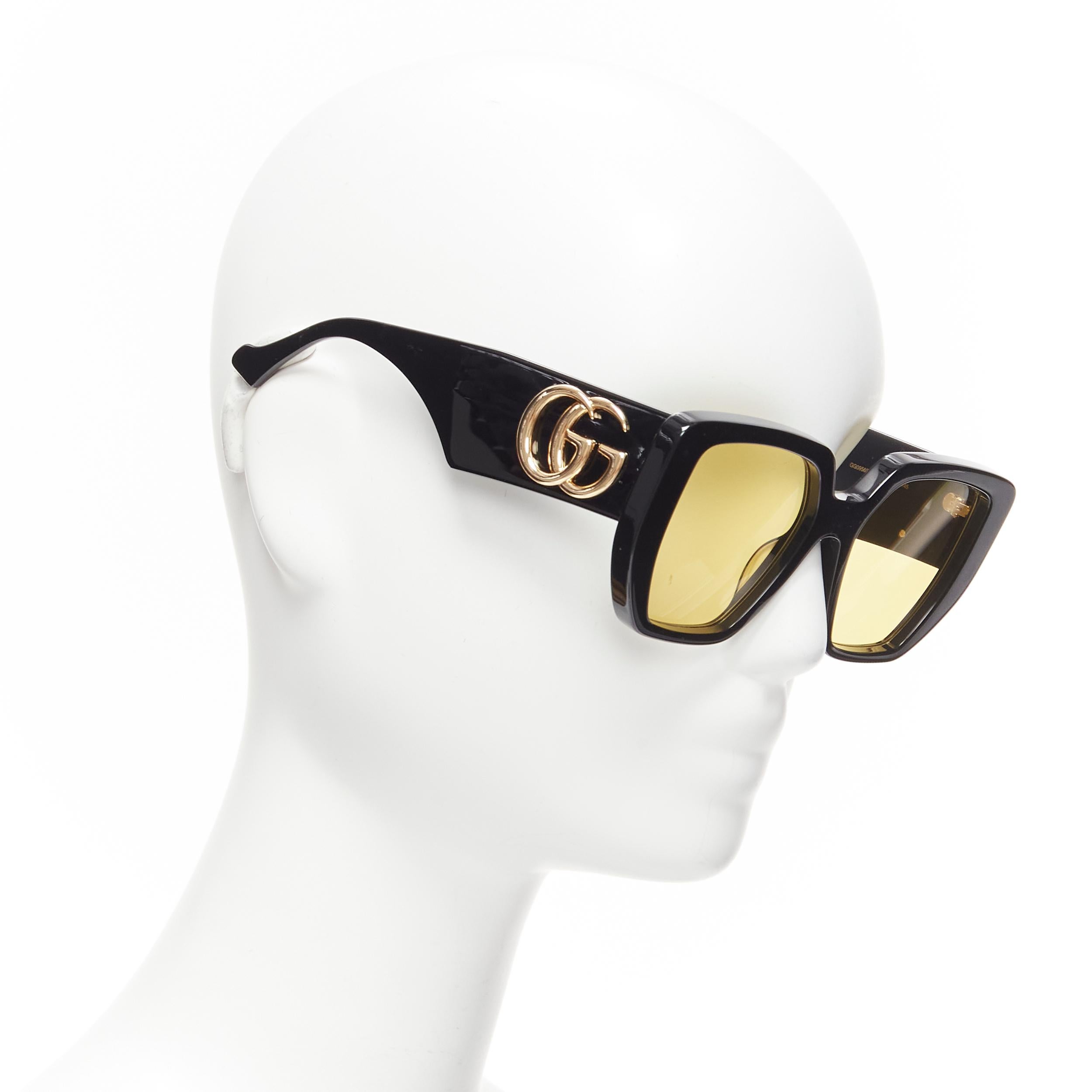 GUCCI GG0956S black gold GG logo yellow lens oversized sunglasses
Reference: TGAS/D01031
Brand: Gucci
Designer: Alessandro Michele
Model: GG0956S
Material: Acetate
Color: Black, Gold
Pattern: Solid
Lining: Black Acetate
Extra Details: Logo at