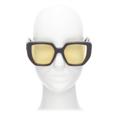 Gucci GG0956S occhiali da sole oversize con logo GG oro nero e lenti gialle