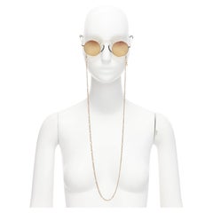 GUCCI GG0991S Gelbe gerundete Sonnenbrille mit Kette aus schwarzem Linsen und schwarzem Geomritc