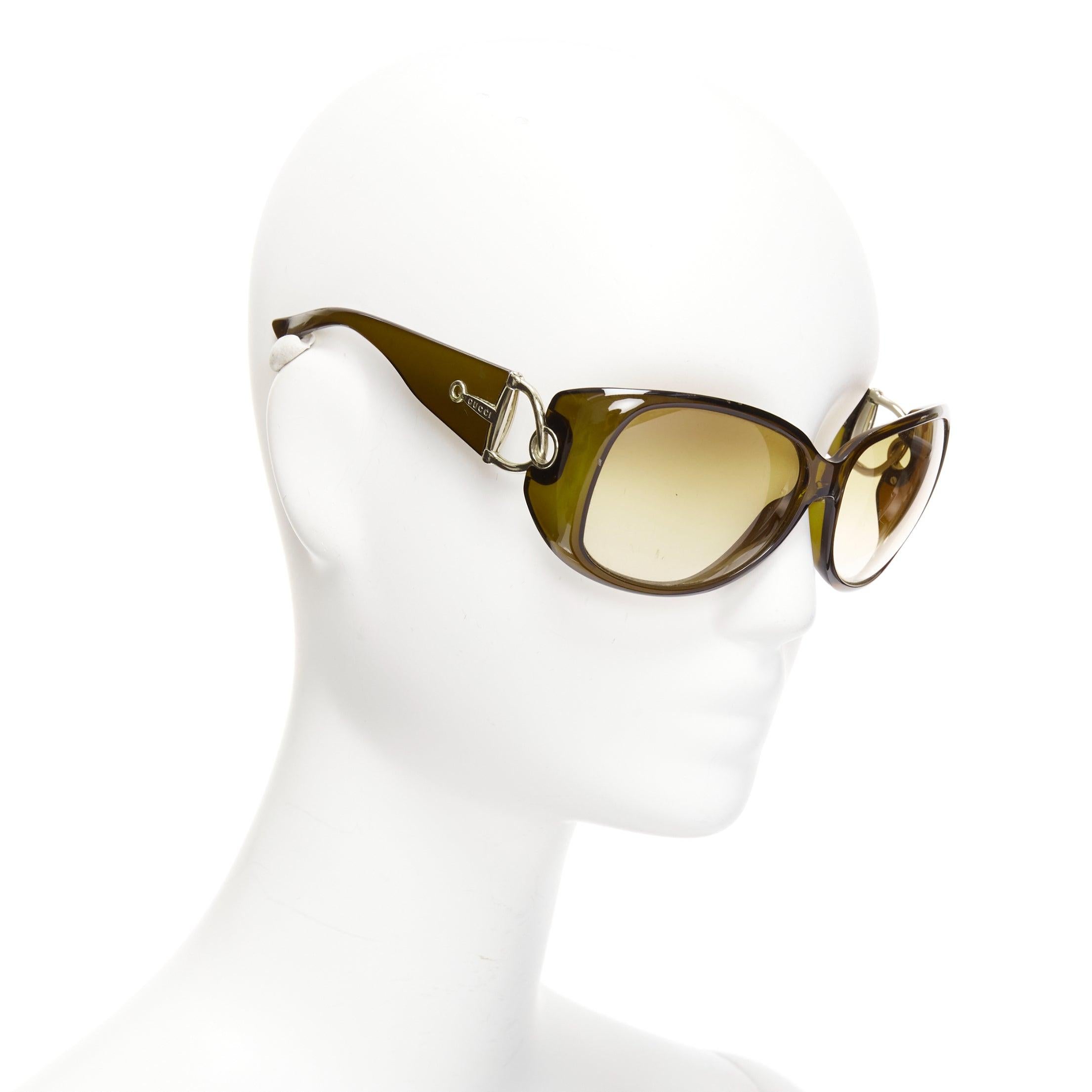 GUCCI GG2951E/S dark green silver GG bamboo buckle side wrap sunglasses
Reference: CNPG/A00050
Brand: Gucci
Model: GG2951E/S
Material: Acetate
Color: Green, Brown
Pattern: Solid
Lining: Green Acetate
Extra Details: Logo at sides with signature