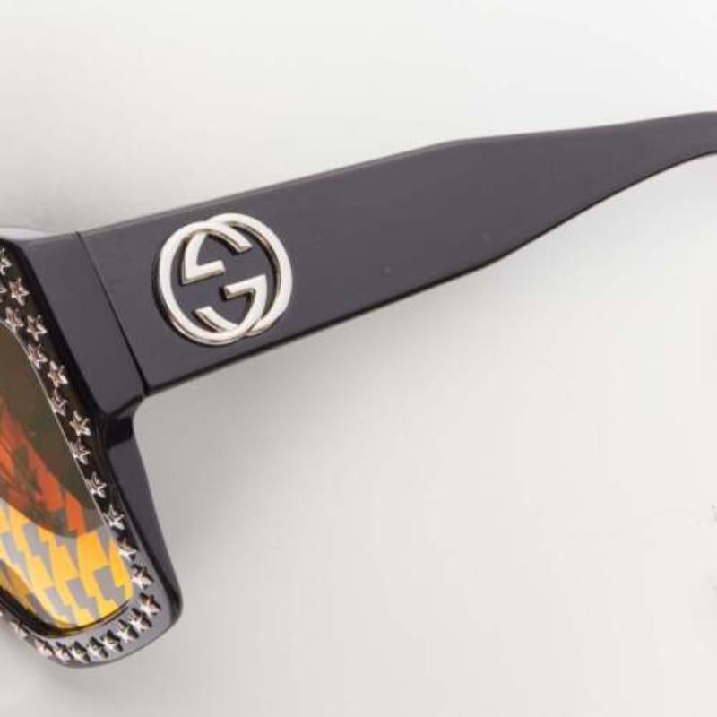 GUCCI GG3870S orange lightning lens square frame star stud sunglasses
Reference: TGAS/D00621
Brand: Gucci
Designer: Alessandro Michele
Model: GG3870S
Material: Acetate
Color: Black, Orange
Pattern: Star
Lining: Black Acetate
Extra Details: Square