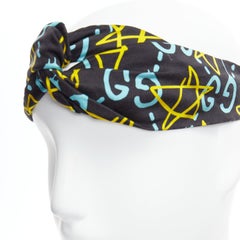 GUCCI Ghost 100 % Seide Graffiti-Stern Monogramm Druck Twist Stirnband