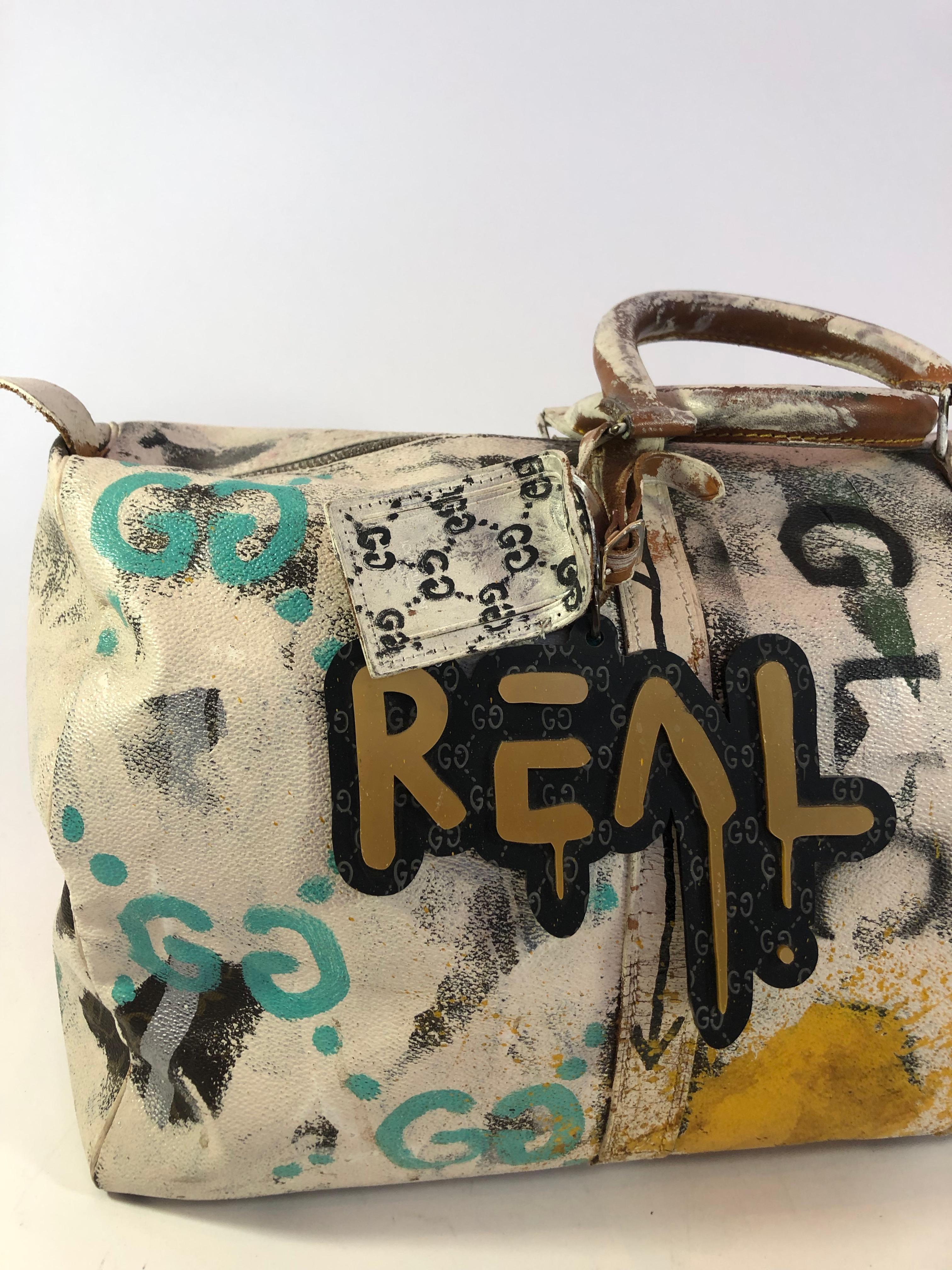 Gucci Ghost One of A Kind original hand painted Louis Vuitton keep all Duffle Bag. The original hand painted artwork done specifically to this bag only. Inside condition is used and shows some wear and stains. Contemporary artwork done on a vintage