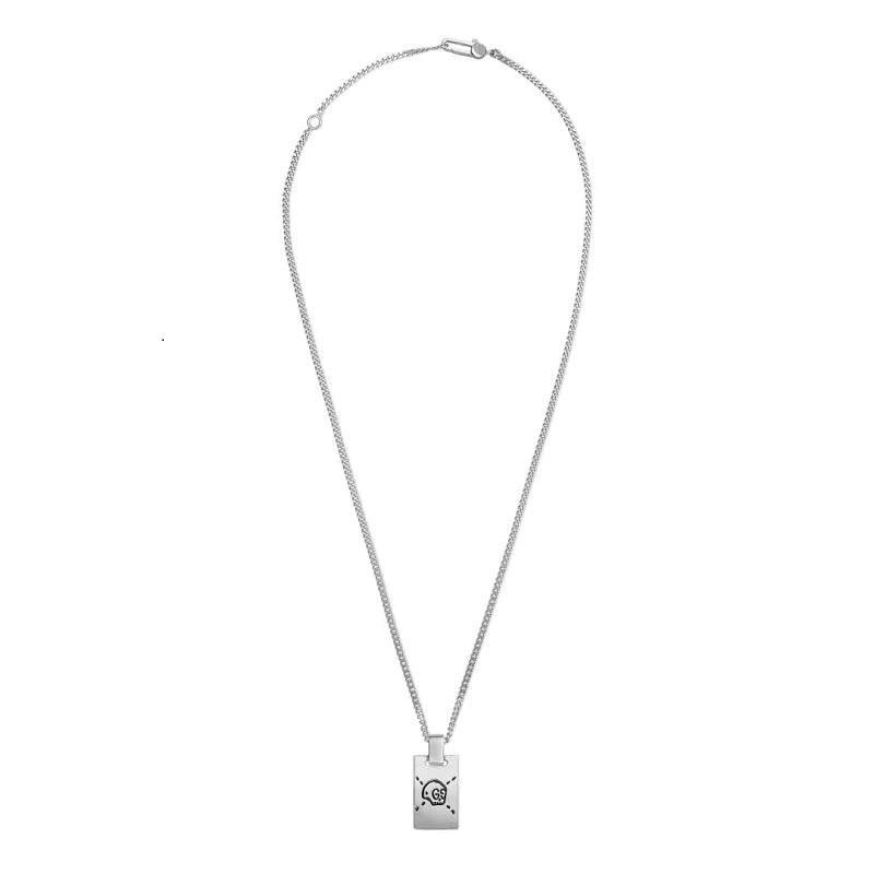 Gucci Ghost Sterling Silver Necklace YBB455315001

The Gucci Ghost Skull Tag necklace is lovingly crafted from polished sterling silver with an aureco black finish, the tag design features a hand-drawn skull engraved with the signature GG logo eyes