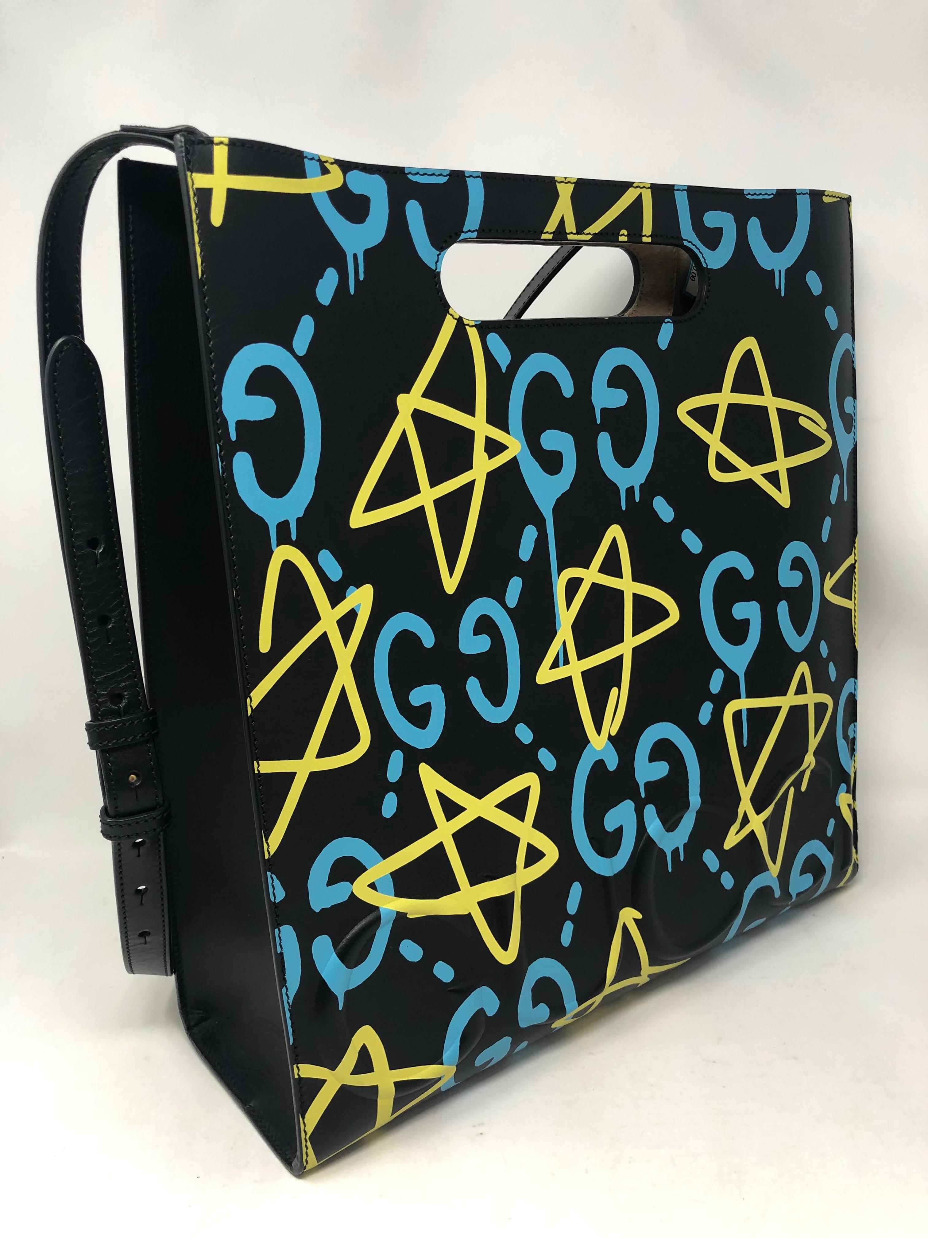 Gucci Ghost Tote Bag with strap. From the GucciGhost Collection. Collaboration between Gucci and Trouble Andrew who is a former Olympic snowboarder and Brooklyn based artist. The collection is iconic and limited. Bag is in excellent condition.