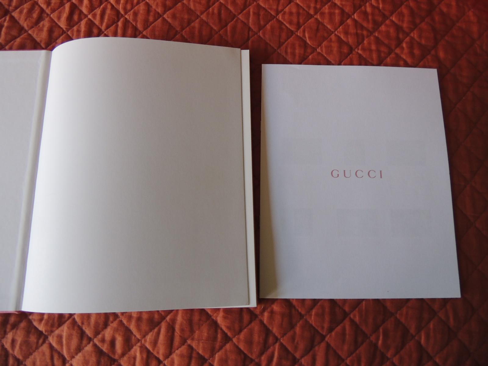 Clothbound Gucci gifts catalog hardcover coffee table book holiday, 2018
Gucci holiday gifts 2018 book catalogue.
Gorgeous Gucci holiday 2018 book! 
Exclusive “Watered Silk” Gucci book with price inserts.
Gold design on the cover.
Size: 10 x 12