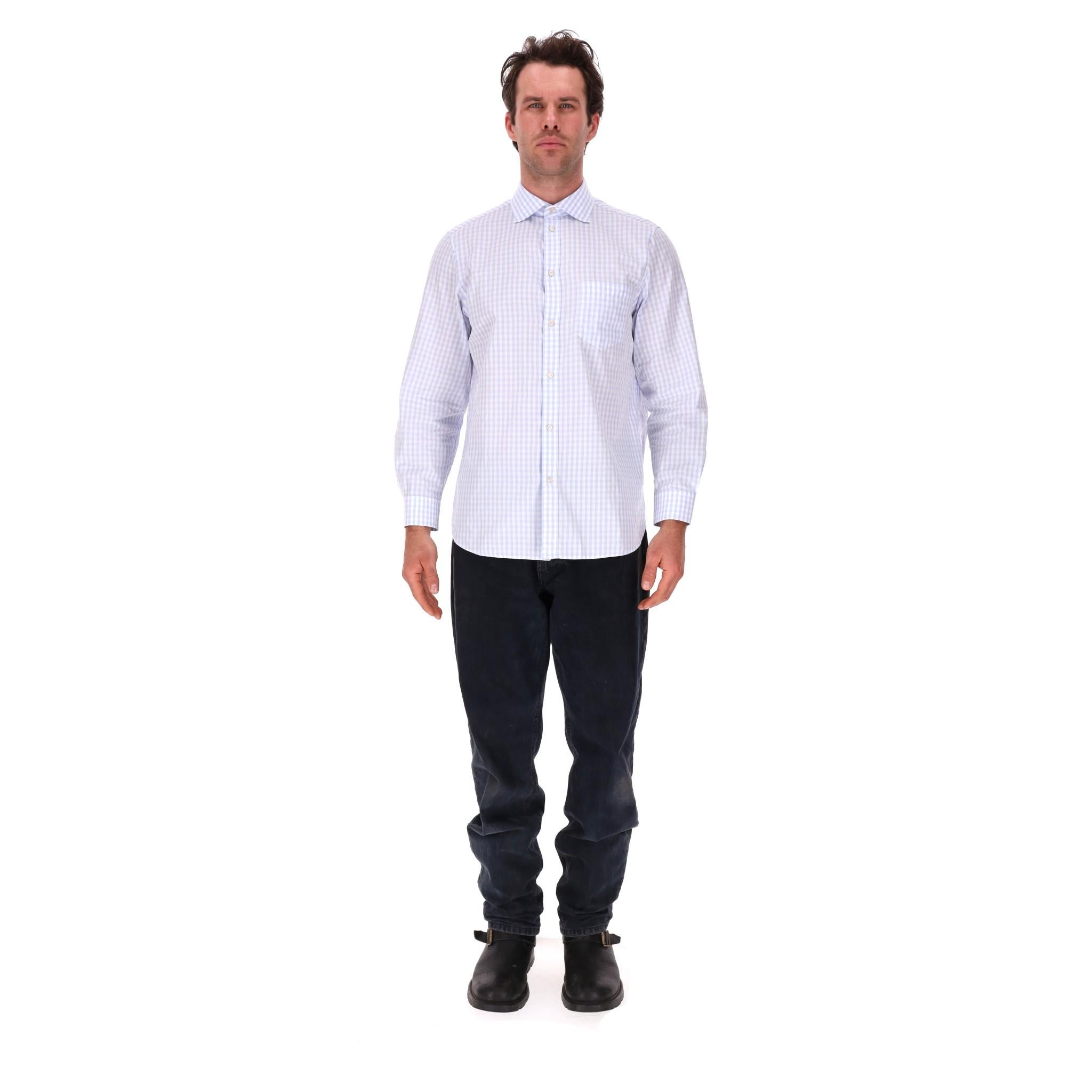 Gucci Gingham Cotton Shirt

Light blue classic shirt crafted from cotton with gingham check pattern.

Classic collar, chest pocket, centre button closure and buttoned cuffs.

Rrp Approx. £520

Size – 41/16

Condition – Very Good

Composition –