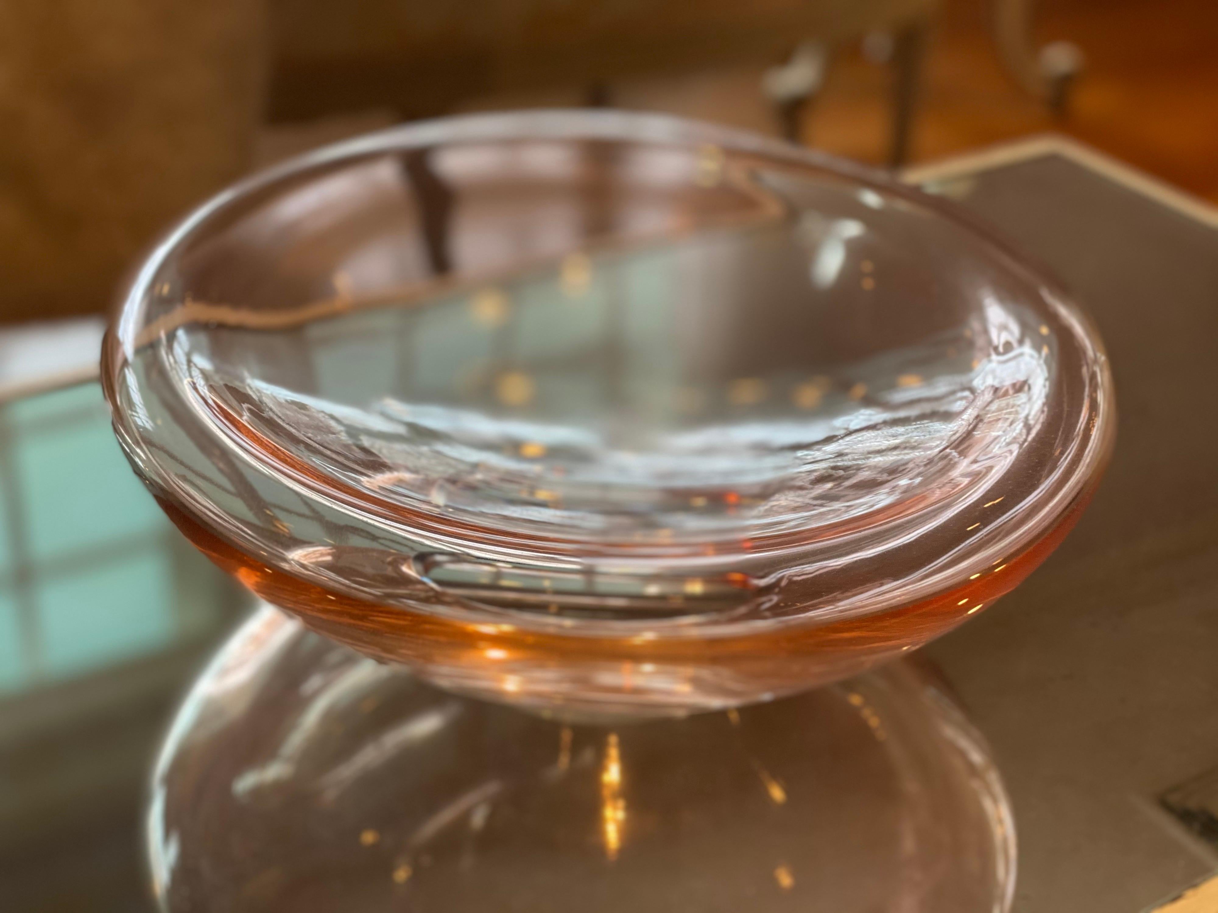Rose colored glass bowl by Gucci. Marked 'Gucci' underside.
Gorgeous shape and style.
Measures: 13.5