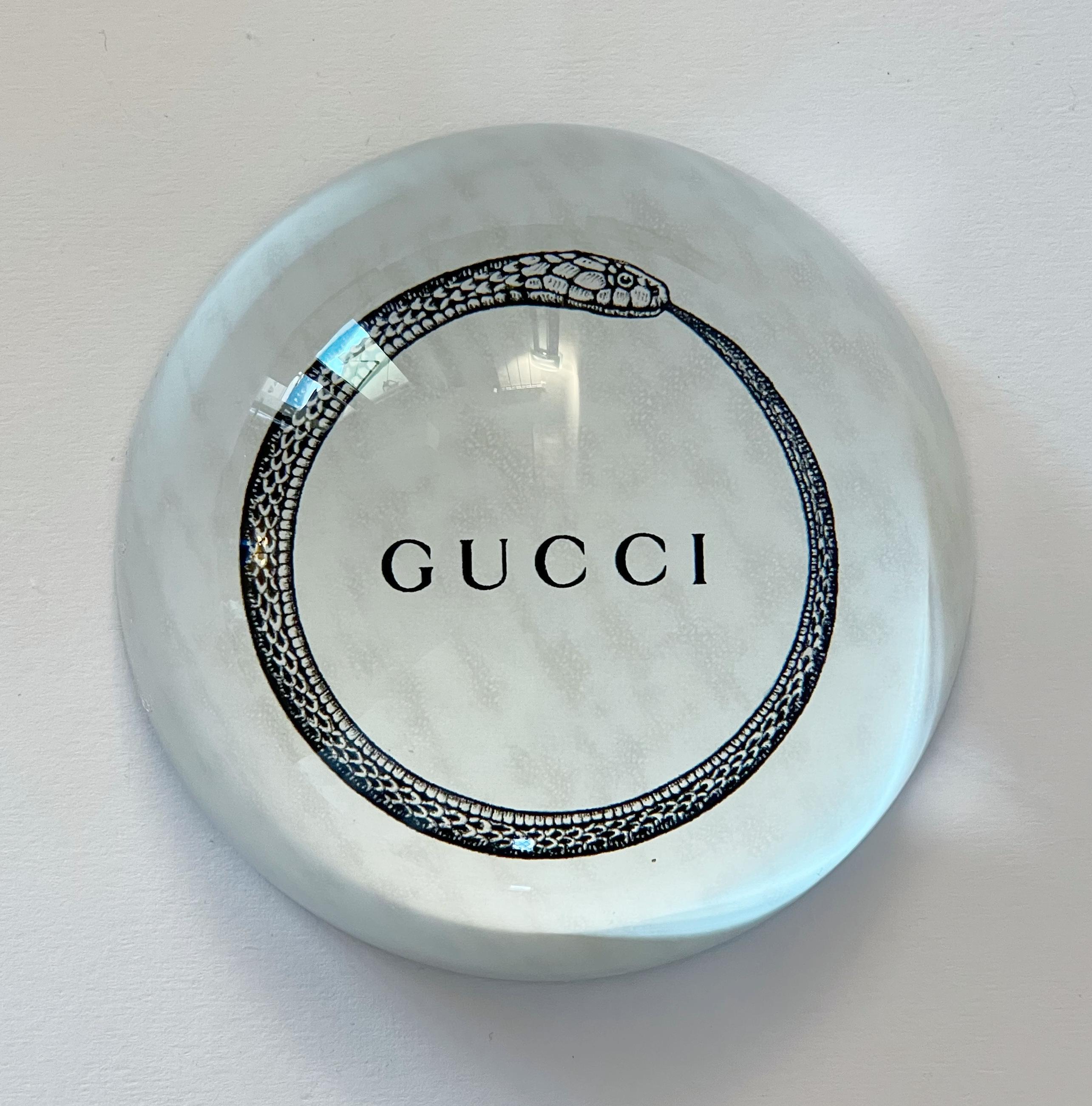 Gucci glass paperweight with logo circled in a snake, comes in original box / Made in Italy
Diameter: 4 inches, height 1.5 inches
1 available in stock in Italy
Order reference #: FABIOLTD G014