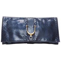 GUCCI glossy scaled leather gold stirrup horsebit foldover long clutch bag