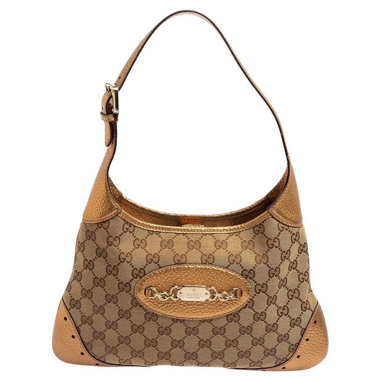 Gucci GoldBeige Guccissima Canvas And Leather Punch Hobo at 1stDibs