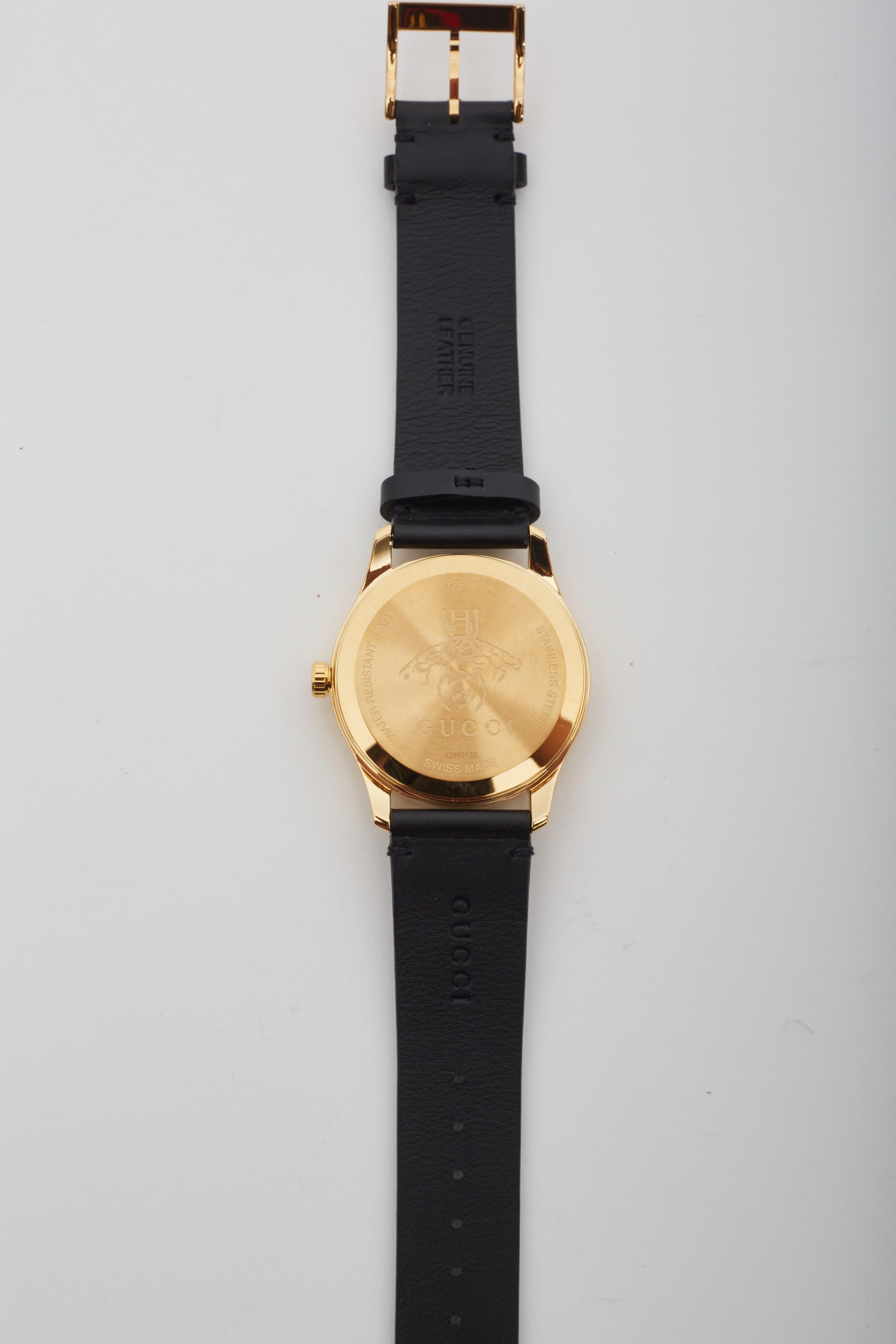 Gucci Gold Black Leather Bee And Stars G-Timeless 126.4 Watch In New Condition In Montreal, Quebec