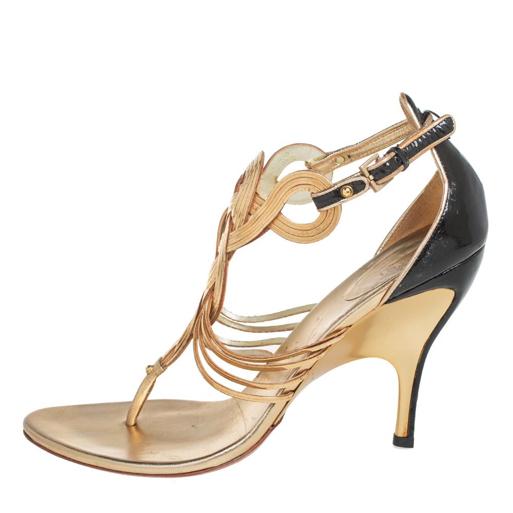 Flaunt these fabulous sandals from Gucci as you step out in style. Wear these patent leather and leather sandals when you go out and watch heads turn. The sandals are at their stylish best and are fitted with high heels for an added flair. A pair of