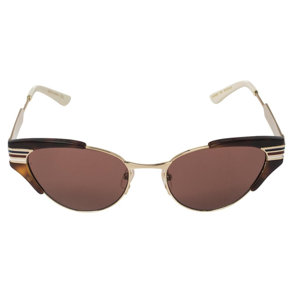 This pair of sunglasses is super trendy. Made from acetate and gold-tone metal, the pair features a cat-eye shape and protective lenses. The sunglasses will not just shield you on sunny days but will also add to your stylish look.

Includes: