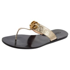 Used Gucci Gold Crinkled Leather GG Marmont Flat Thong Sandals Size 40