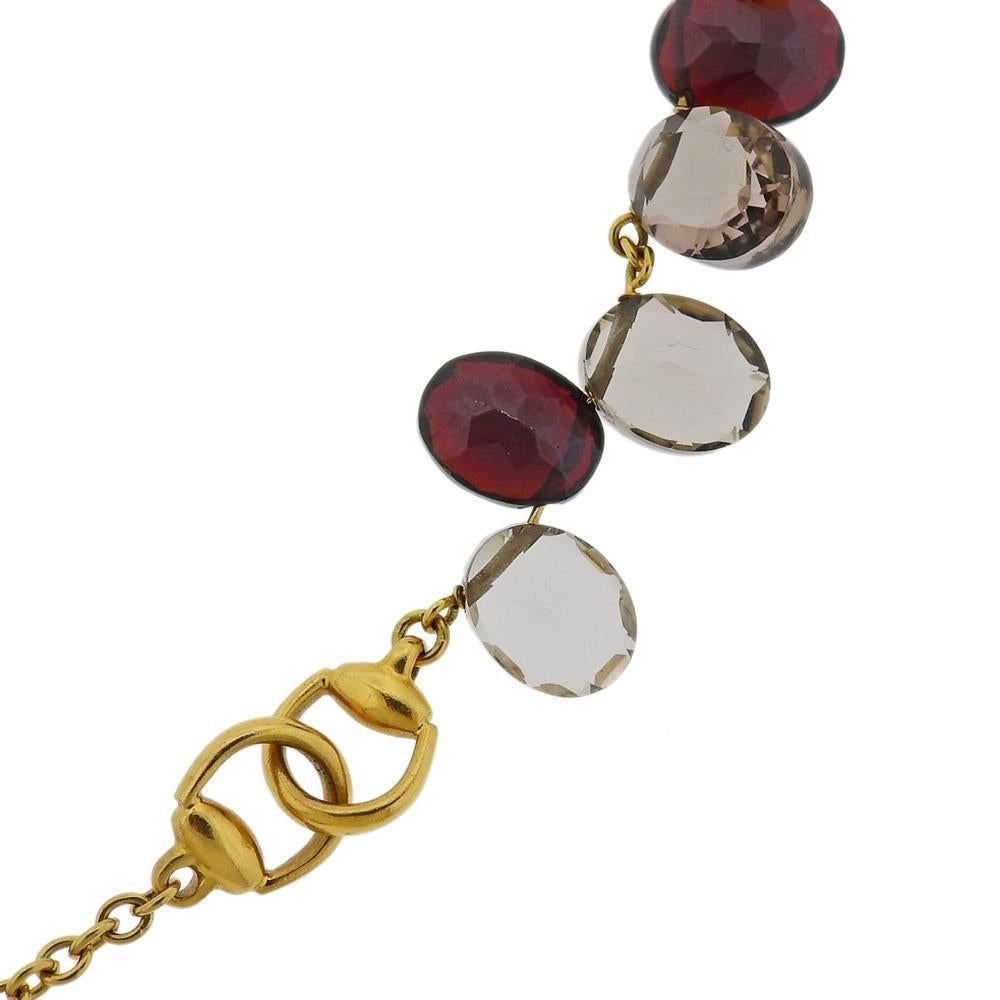 Gucci, collier pendentif en or avec grenat et quartz fumé en vente 1
