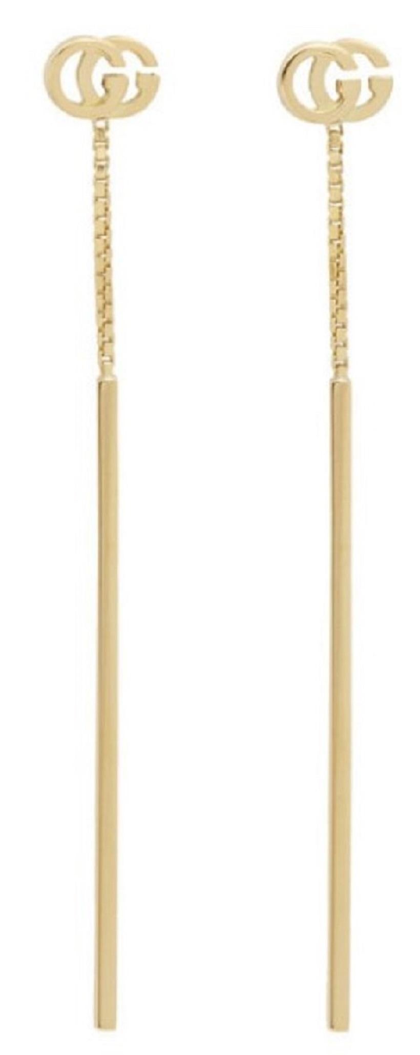 Gucci Gold GG Running Long Pendant Earrings
by Gucci
Pair of earrings in 18k gold.
 Logo plaque at post-stud fastening.
 Approx. 2.5 length.Supplier color: Gold