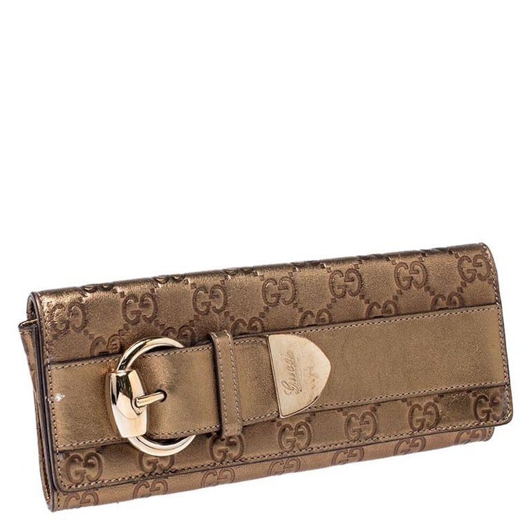 Gucci Gold Guccissima Leather Buckle Continental Wallet For Sale at 1stdibs
