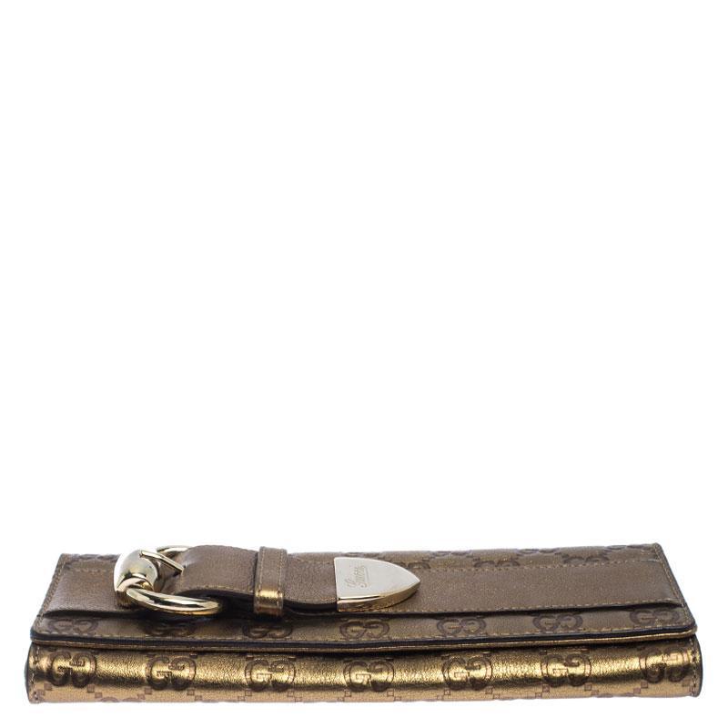 Gucci Gold Guccissima Brieftasche aus Leder mit Lederschnalle im Zustand „Gut“ im Angebot in Dubai, Al Qouz 2