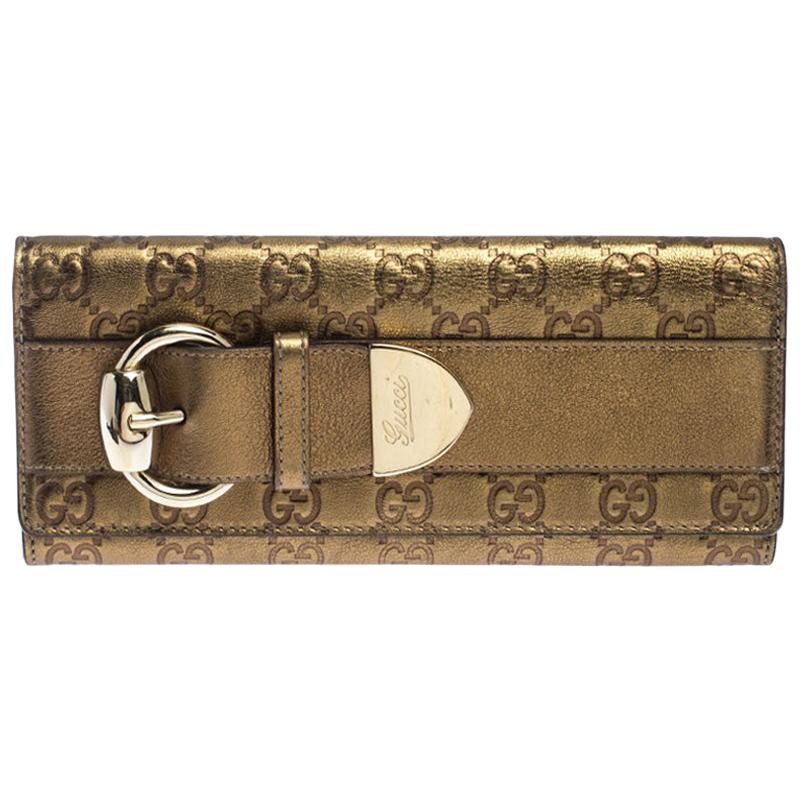 Gucci Gold Guccissima Leather Buckle Continental Wallet