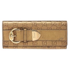 Gucci Gold Guccissima Leather Buckle Continental Wallet