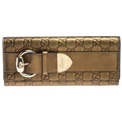 Gucci Gold Guccissima Leather Buckle Continental Wallet