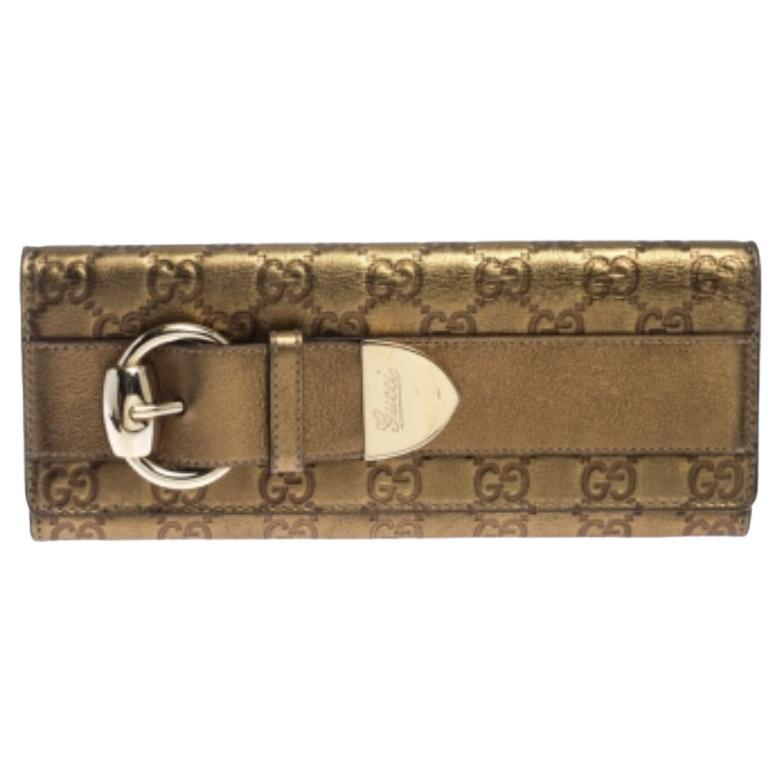 Gucci Gold Guccissima Leather Romy Clutch en venta