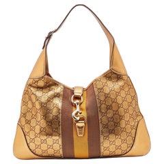 Gucci - Sac hobo « Jackie O Bouvier » en cuir doré Guccissima, taille moyenne