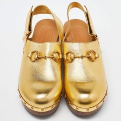 Gucci Sandali in pelle oro Amstel Horsebit Slingback Clog Taglia 38