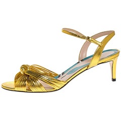 Gucci Gold Leder Crawford Knöchelriemen Sandalen Größe 38::5