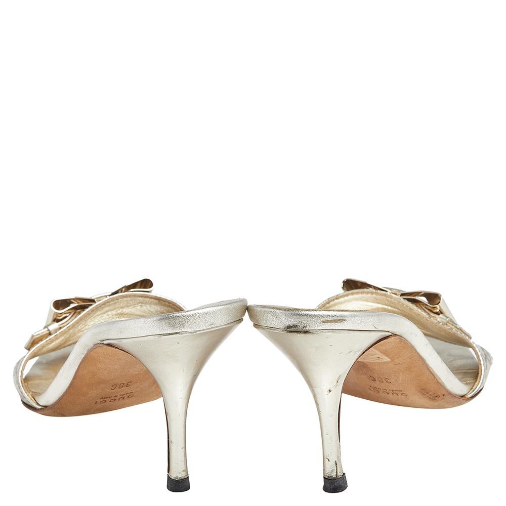 Treat your feet to these amazing slide sandals from the House of Gucci. They are made from gold leather with a gold-toned Interlocking G buckle detail perched on the upper. Charming and stylish, these sandals will elevate the look of your ensemble