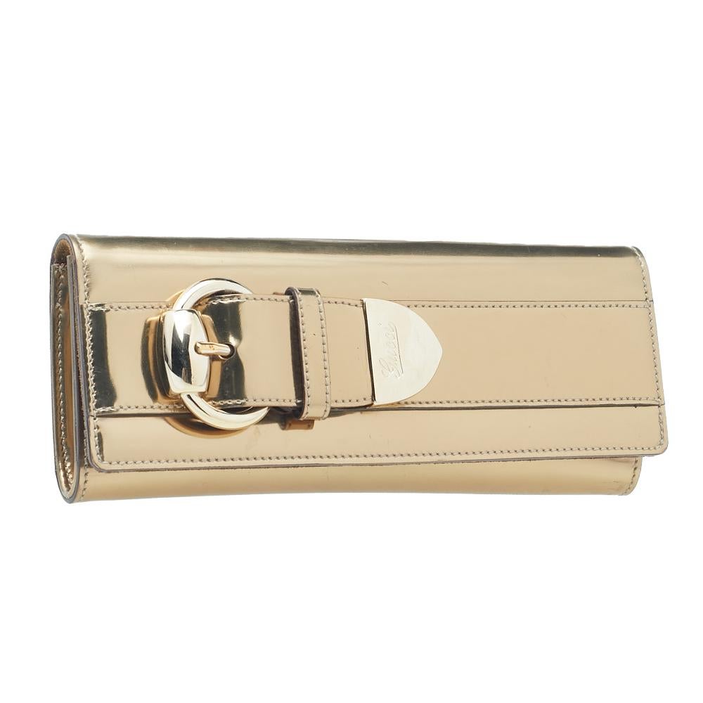 Gucci Gold Leather Lady Buckle Clutch In Good Condition In Dubai, Al Qouz 2