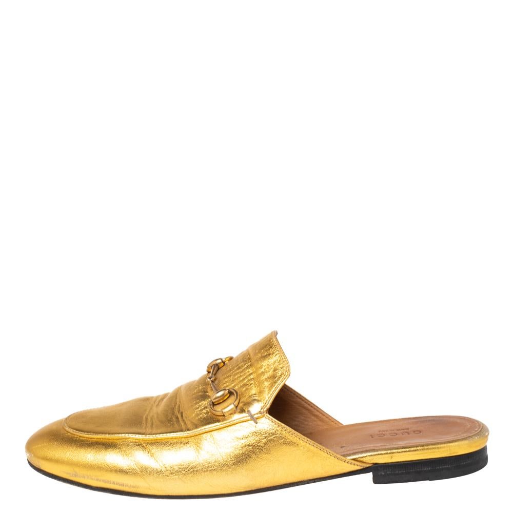These Gucci Princetown slides are a fresh update on the perennially chic Gucci Horsebit loafers. These shoes are enhanced by a gold-tone Horsebit detail that has defined the Gucci collection since the very beginning. This pair is crafted beautifully