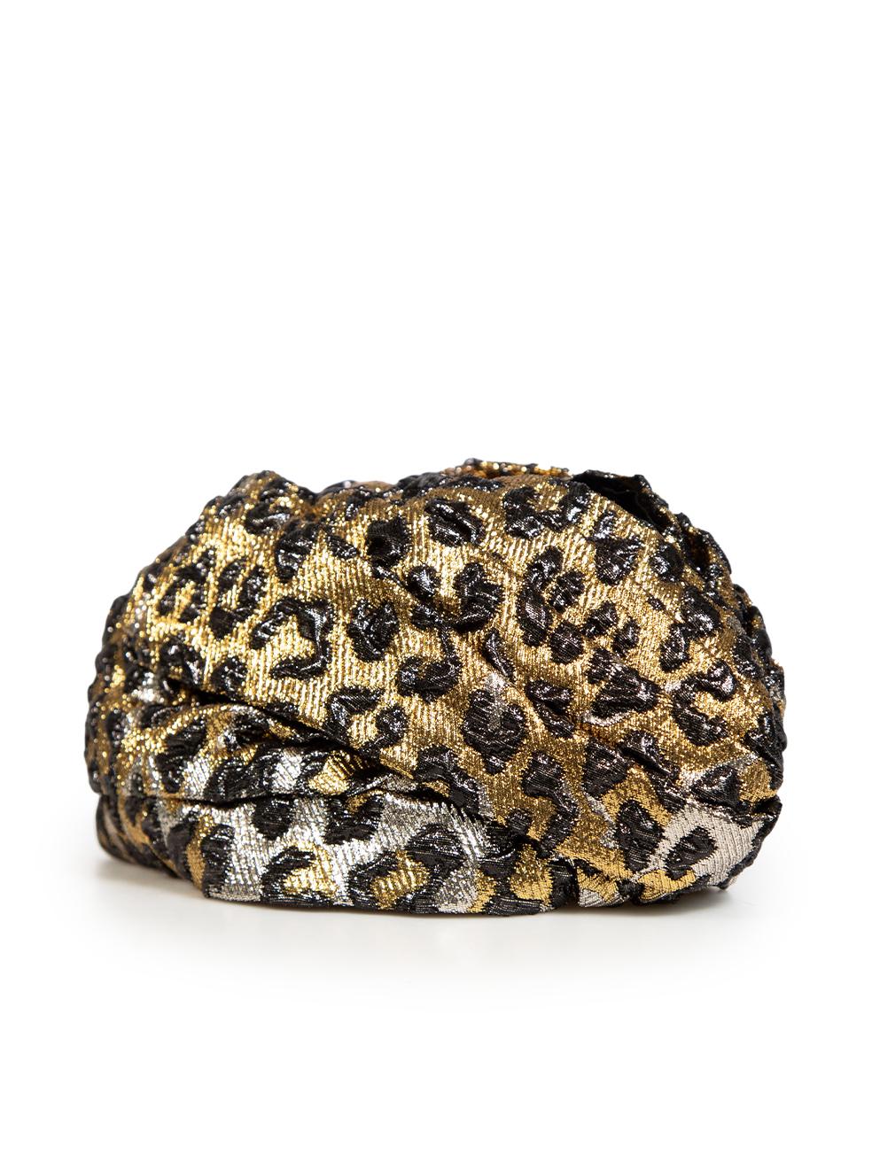 CONDITION is Very good. Minimal wear to headband is evident. Minimal wear with a loose composition label on this used Gucci designer resale item.
 
 Details
 
 
 Gold
 
 Synthetic
 
 Headband
 
 Leopard pattern
 
 Bow detail
 
 
 
 
 
 Made in