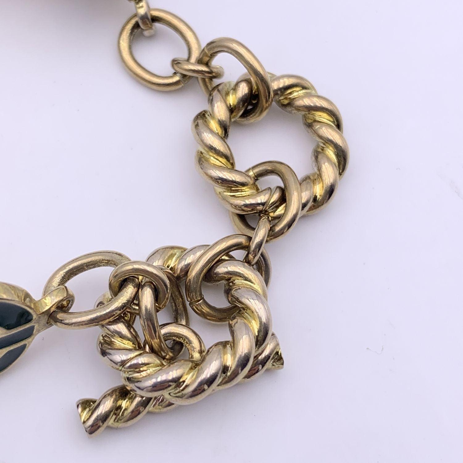 Gucci Gold Metal Red Green Enamel Lion Head Toggle Chain Bracelet In Excellent Condition For Sale In Rome, Rome